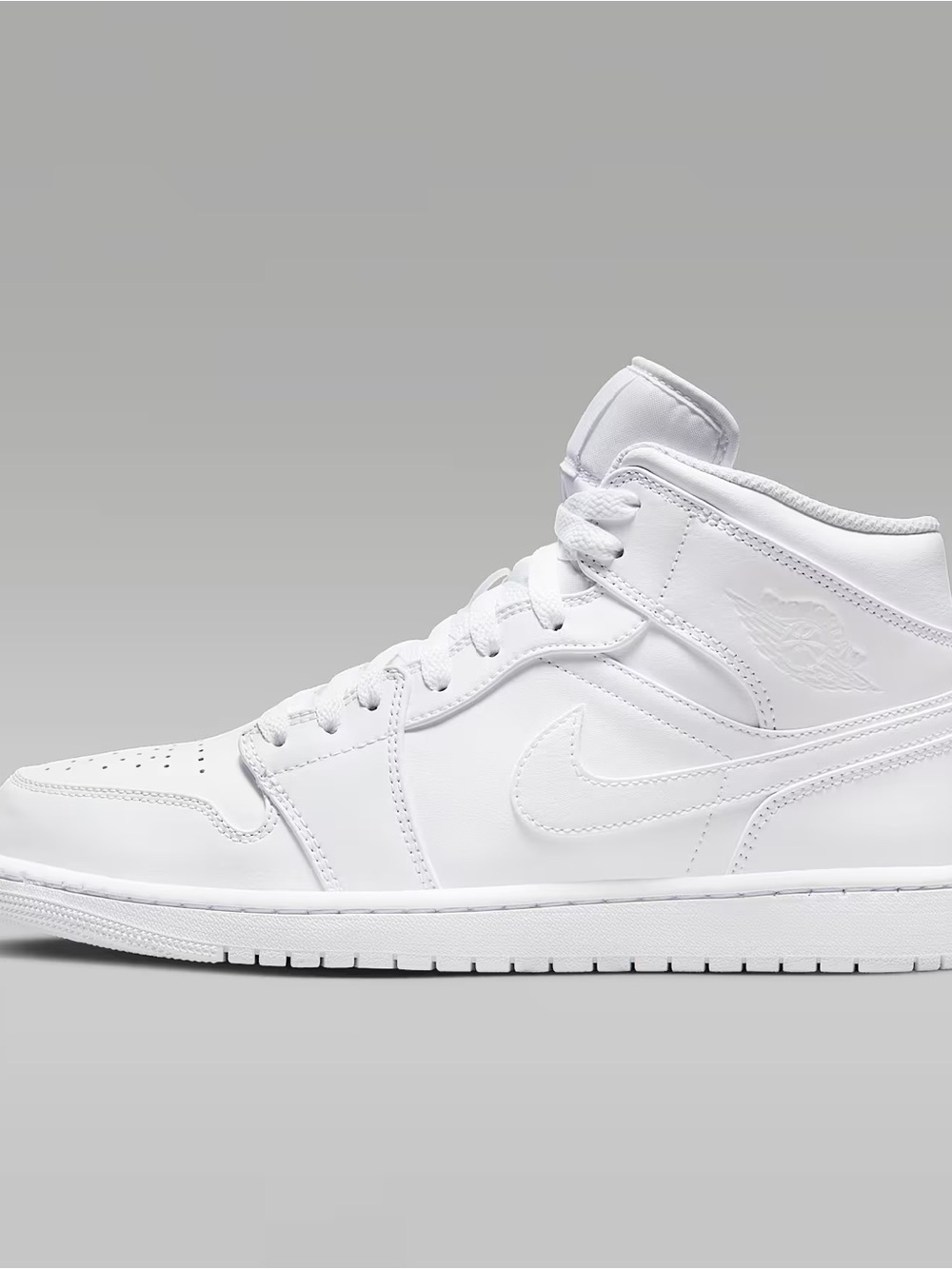 Classic All-White Nike Air Jordan 1 Mid Leather Sneaker
